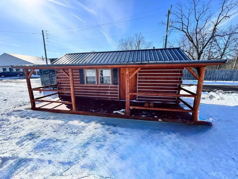 Maple Valley pine cabin with metal roof and porch