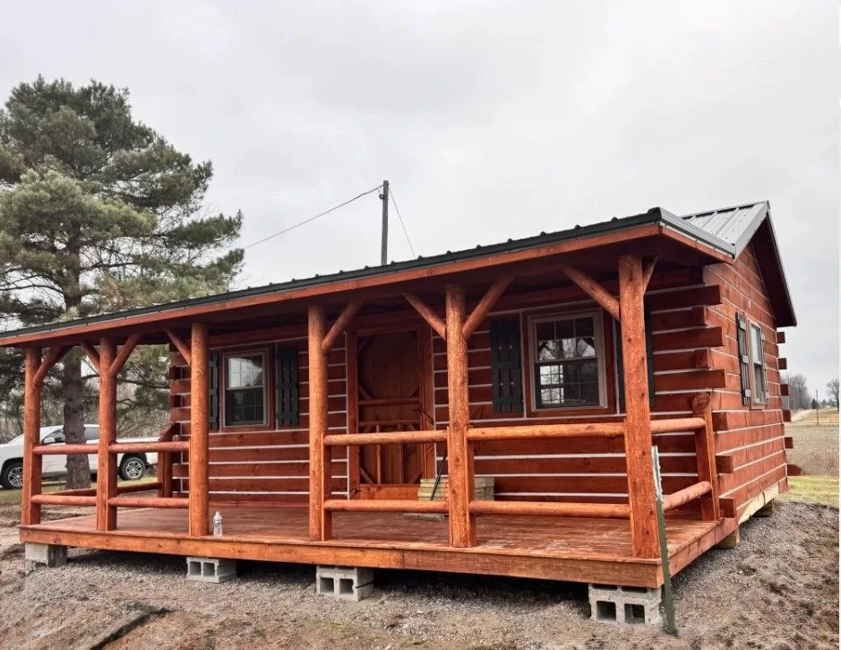 Pine Ridge cedar log cabin with full porch