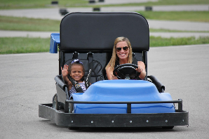 A happy young driver in a Kart Kountry go-kart